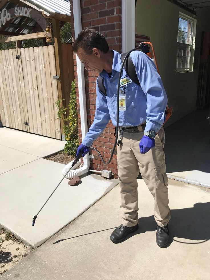 Pest Control professional at work in Southwest Florida